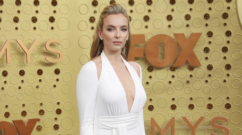 Jodie Comer wearing a white v-neck dress at the Emmy awards