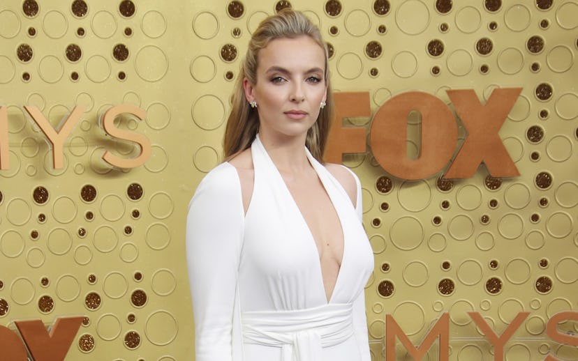 Jodie Comer wearing a white v-neck dress at the Emmy awards