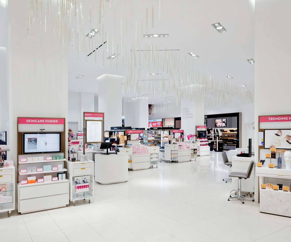 A big white room filled with beauty products from the new beauty floor of Nordstrom's