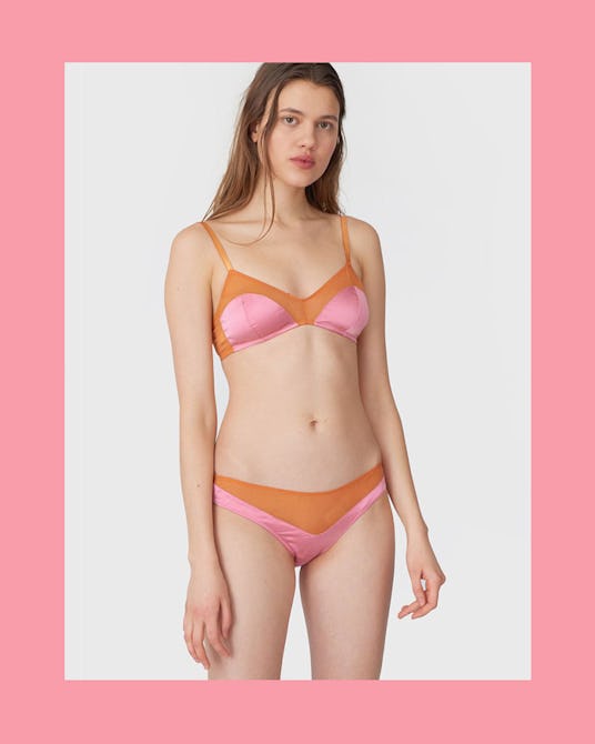 The model is dressed in Beatrice Bralette Honey and Aaron Panty Honey by Araks.