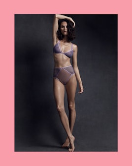 The model posing in Taryn Winters' Kelani demi cup bra and panties