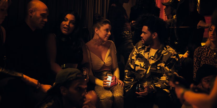 The Weeknd scene from uncut gems while hanging out with people at a party