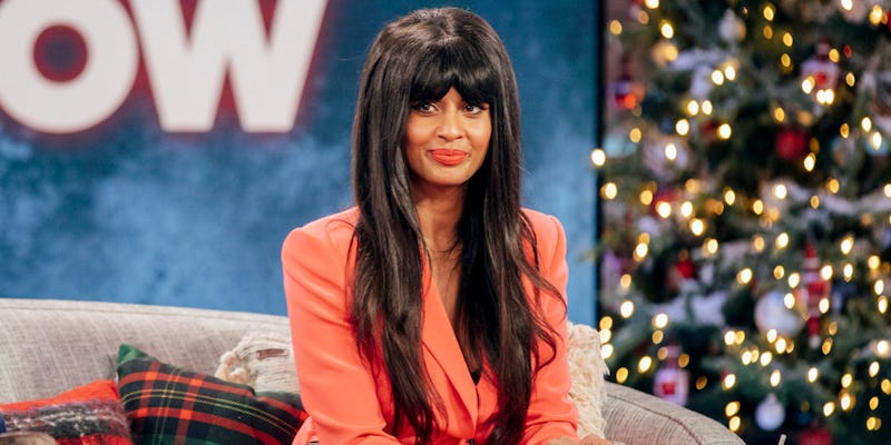 Jameela Jamil smiling at a talk show