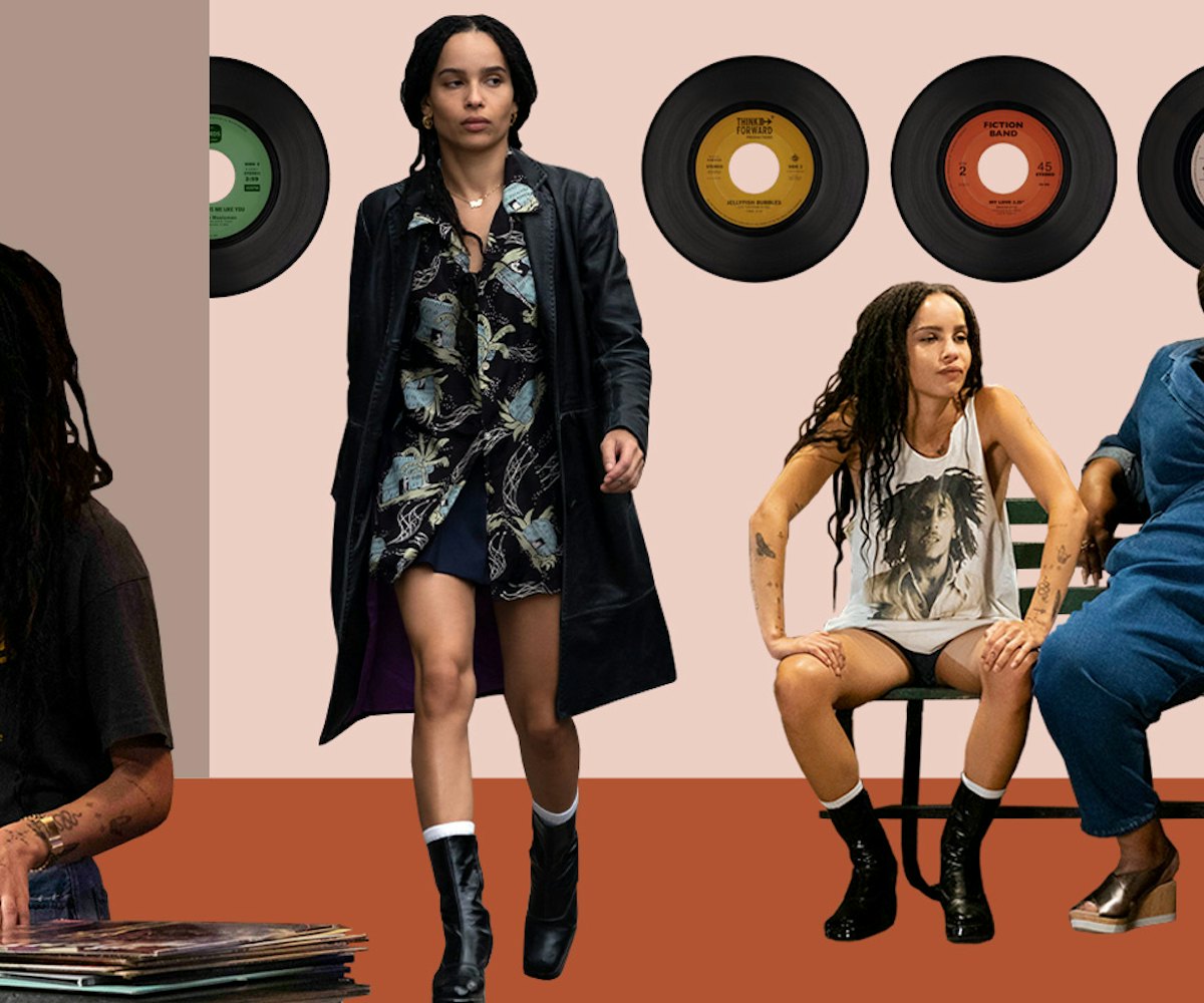Zoë Kravitz standing in front of a wall with vinyl records hanging wearing her own clothes in High F...