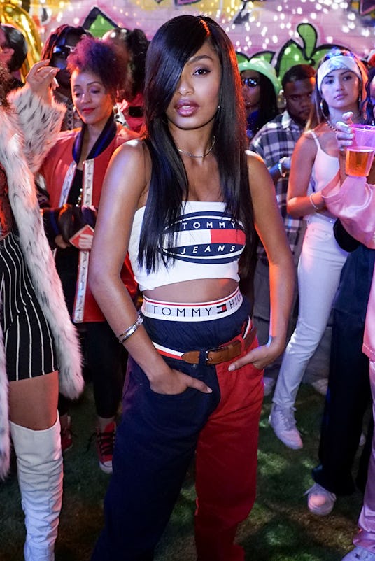 Yara Shahidi dressed up for a pop culture-themed costume party in a Tommy Hilfiger top and pants dre...