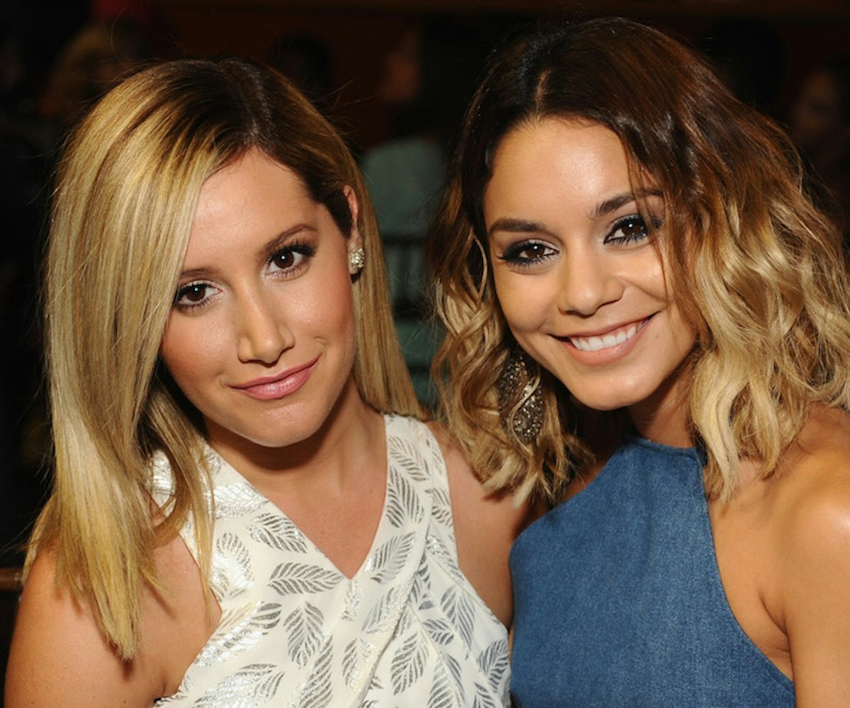 Actress Ashley Tisdale and honoree Vanessa Hudgens (R) in the audience at the 2014 Young Hollywood A...