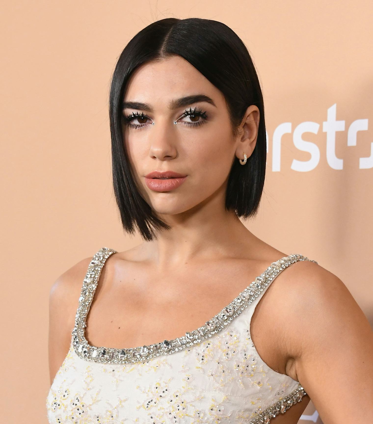 Dua Lipa’s Best Beauty Moments, From Bangs To Highlights