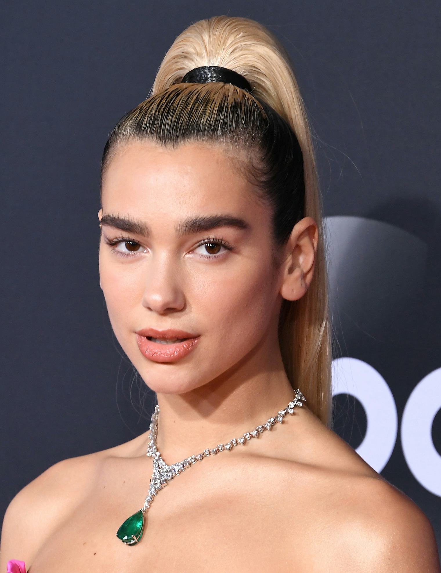 Dua Lipa’s Best Beauty Moments, From Bangs To Highlights