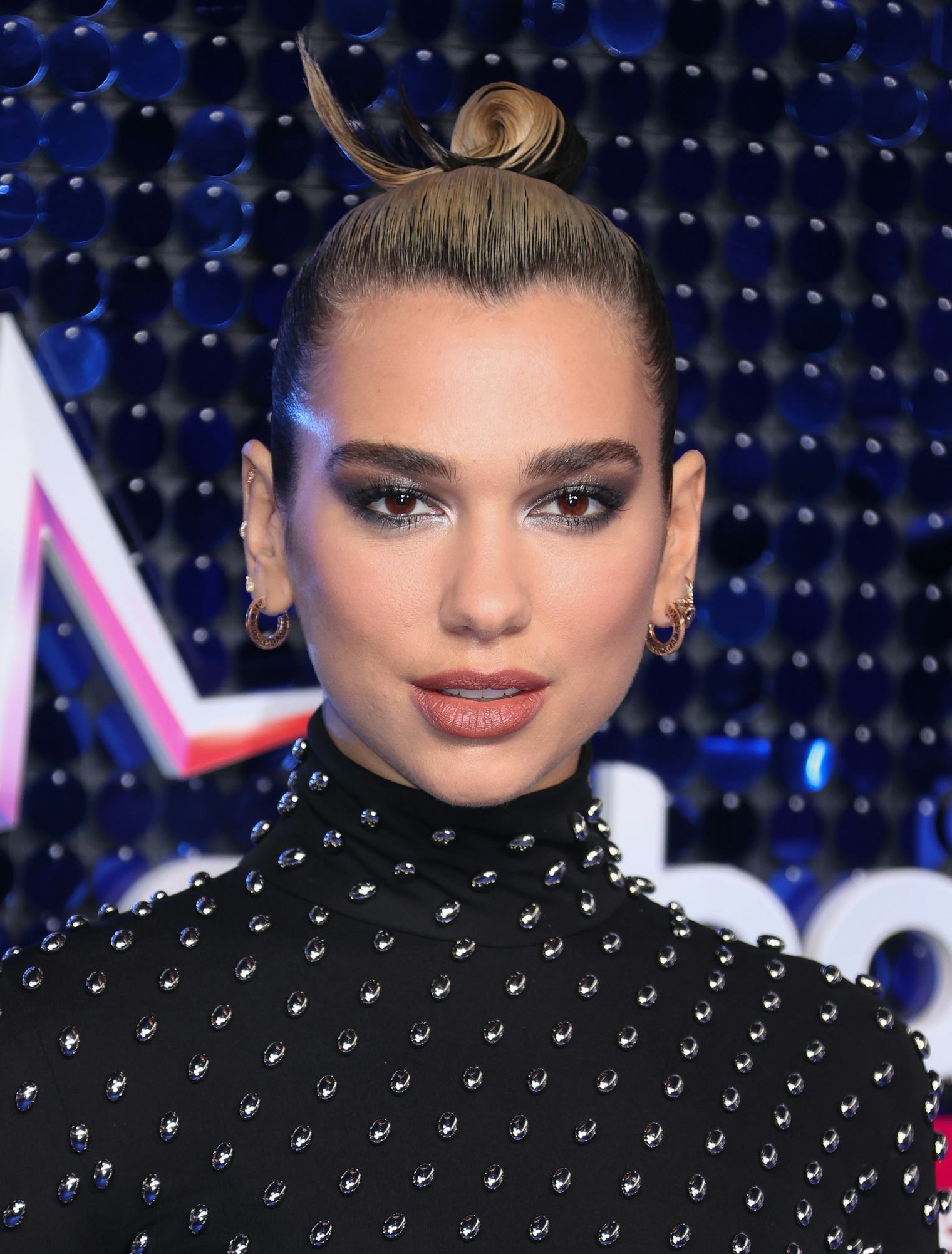 Dua Lipa’s Best Beauty Moments, From Bangs To Highlights