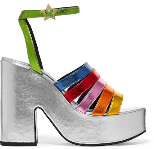 Man Repeller-Designed Shoes with a large wide silver base, and rainbow straps