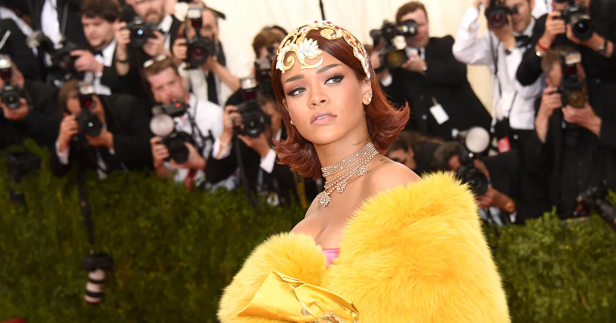 Rihanna Wore A Gold Cape Gown To Met Gala 2015 And She Looked Like A Total Empress Rihanna Wore A Gold Cape Gown To Met Gala 2015 And She Looked Like A Total Empress