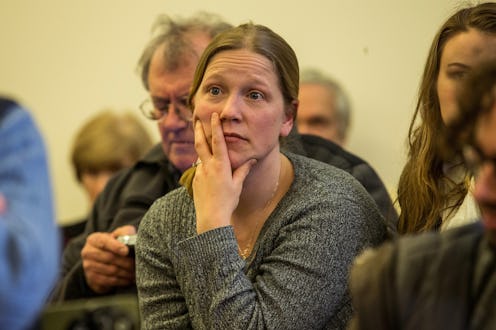 A woman that does not rely on faithless electors sitting on a chair