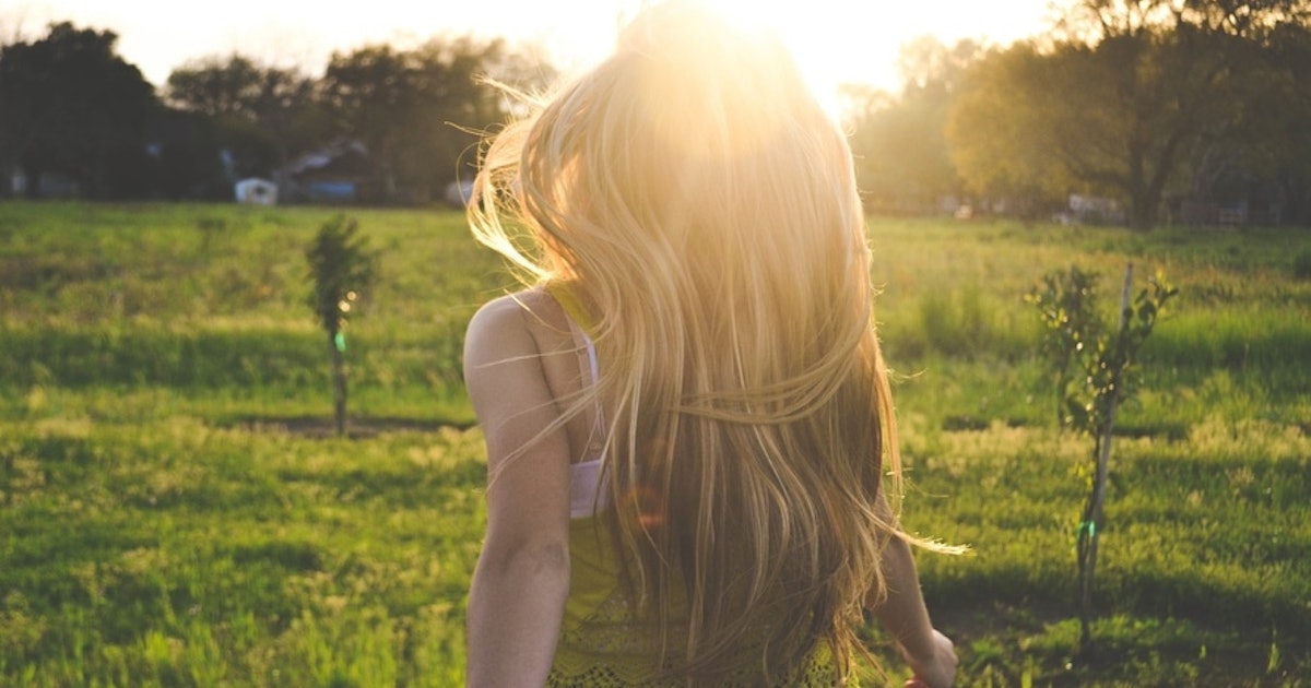 Why Does Hair Get Lighter In The Summer? It's Not Just From The Sun
