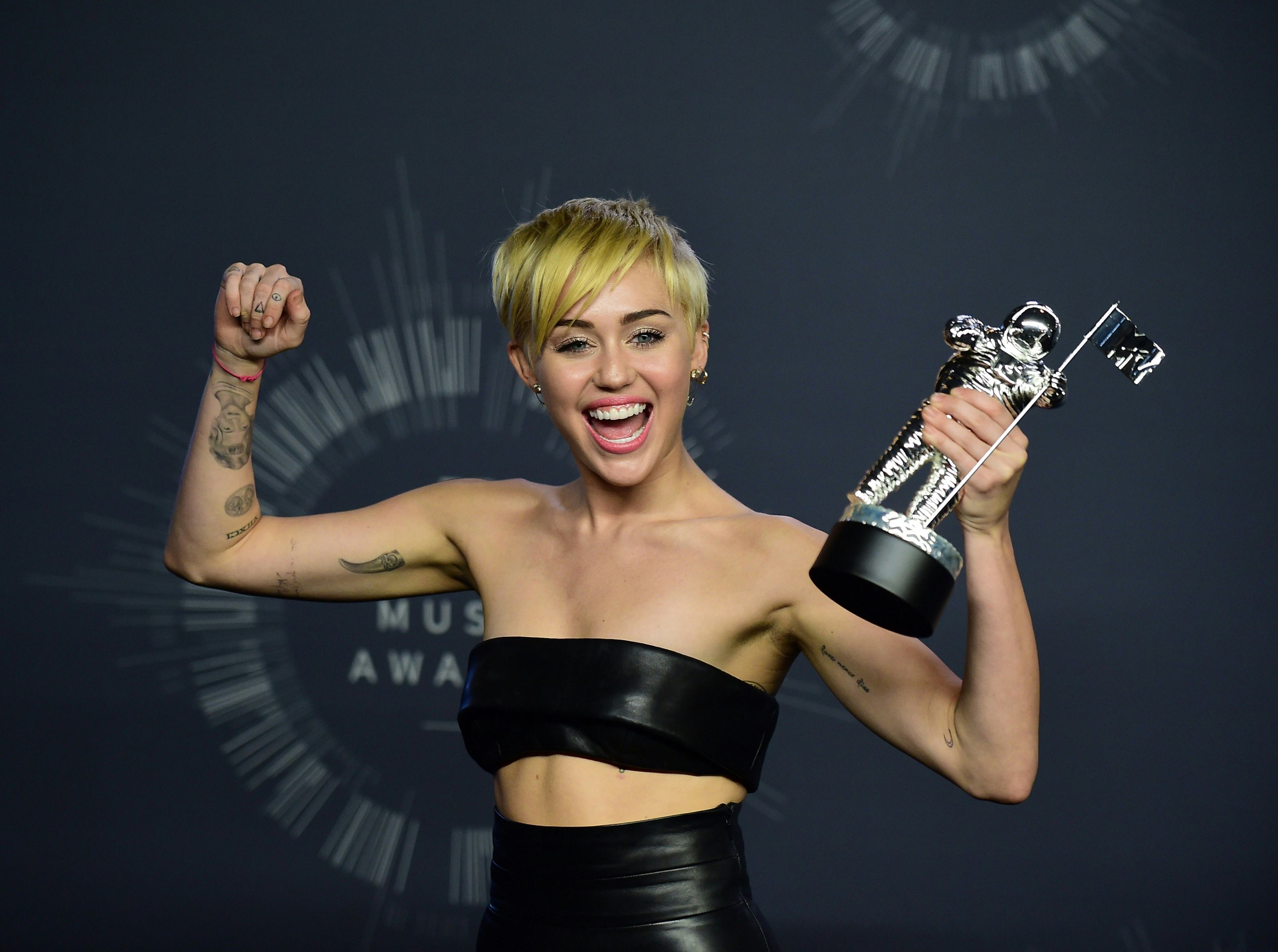 Miley Cyrus Named PETA's Sexiest Vegetarian Celebrity & She Absolutely