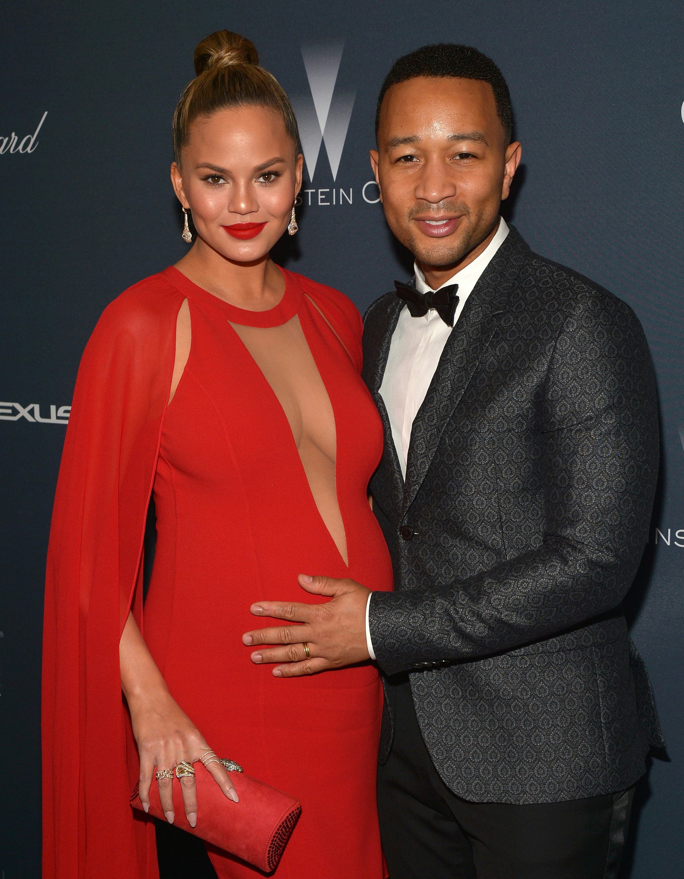 Chrissy Teigen & John Legend Sum Up Modern Romance In One Single Photo