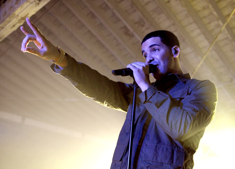 Rapper Drake throws up a peace sign. Here's what "with my woes" from Drake's song "Know Yourself" me...