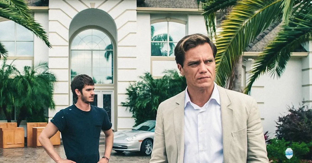 A still from the movie 99 Homes, showcasing the ruthless real estate agent Rick Carver