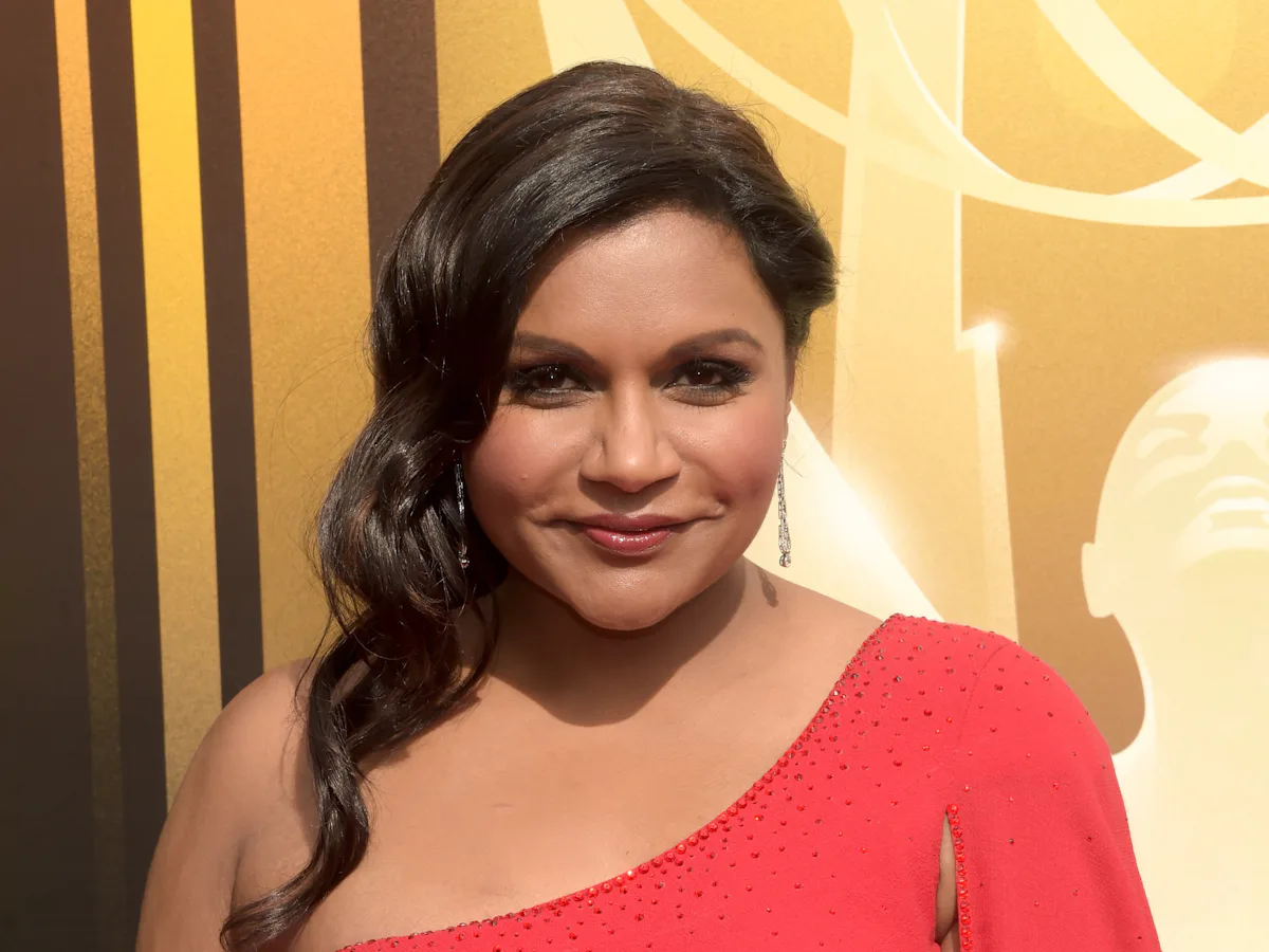 mindy kaling red dress 7 Red Midi Dresses to Wear When You Want to Stand Out
