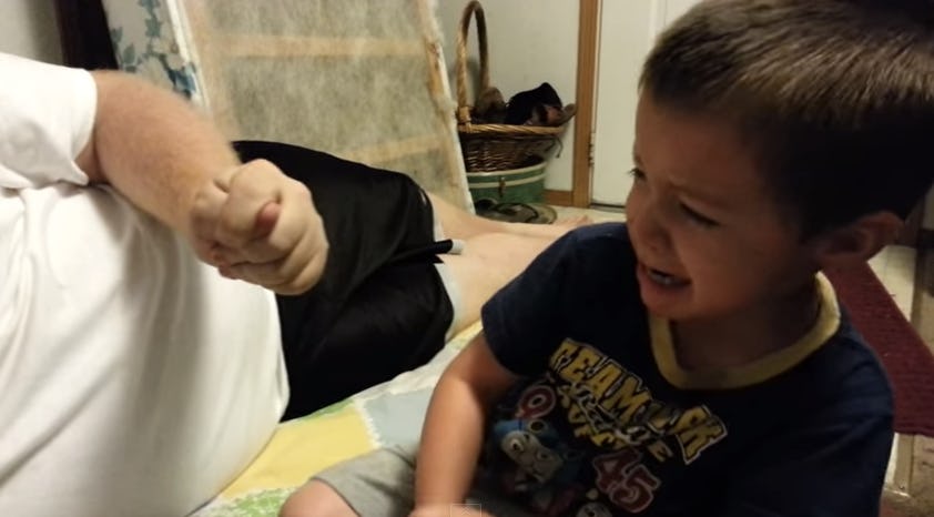 Little Boy Horrified When Dad "Takes" His Ear, In The Cutest Video You