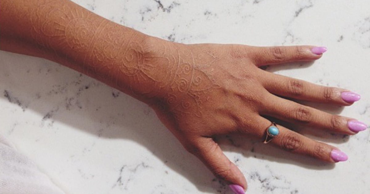 White Ink Tattoos On Dark Skin Fade Faster, But There Are Other Ways to