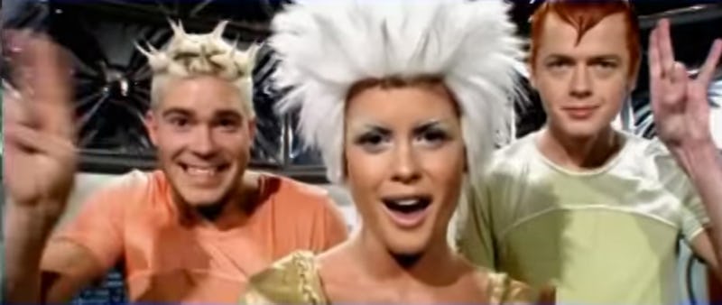 Aqua’s “Lollipop (Candyman)” Music Video Is A SugarCoated Trip To
