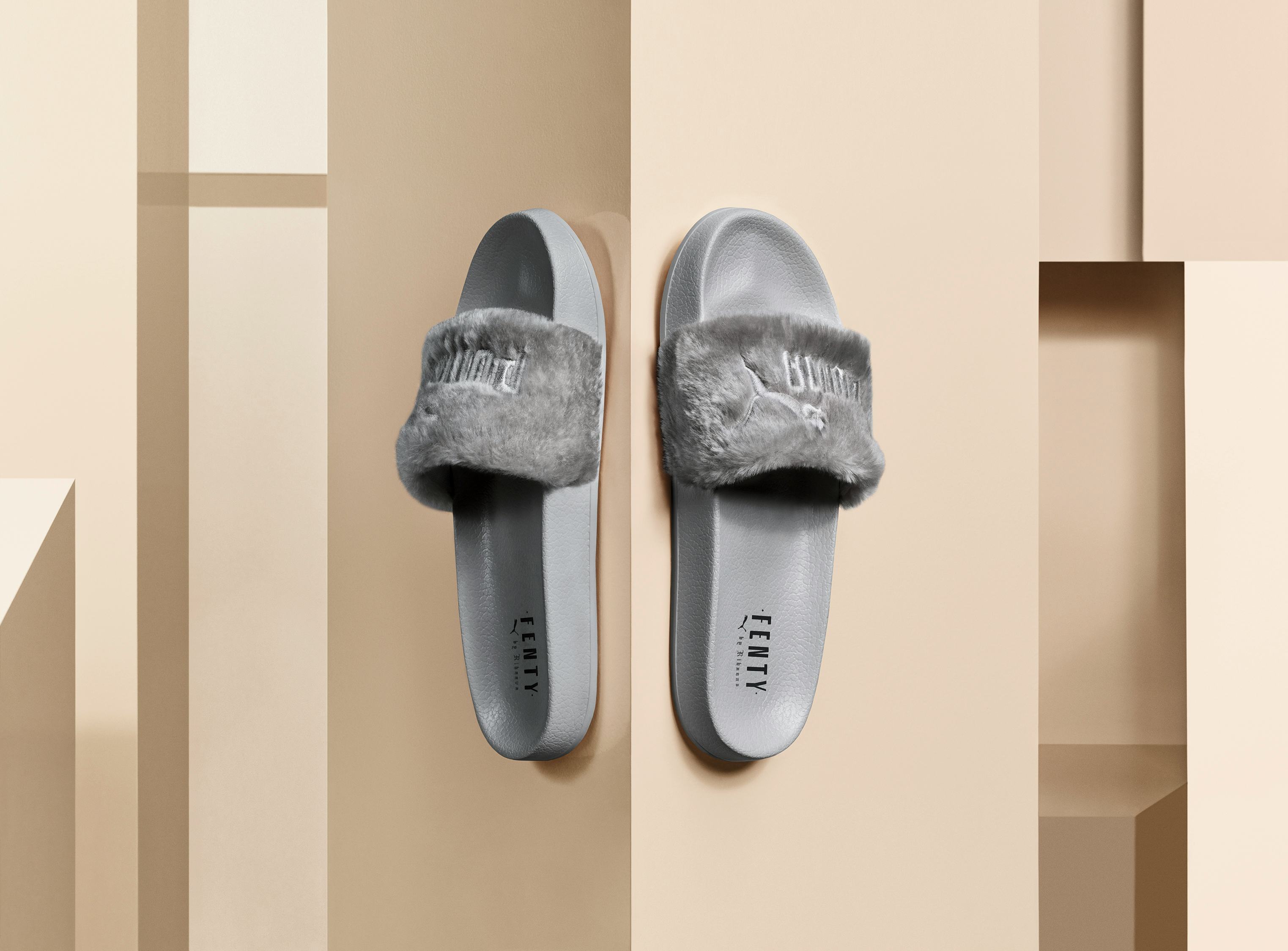 grey fur puma slides