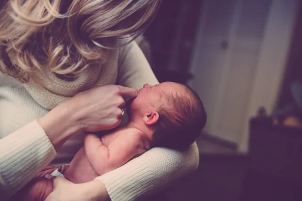 7 Ways To Help New Moms Because Bringing Over Extra Diapers Never Hurts