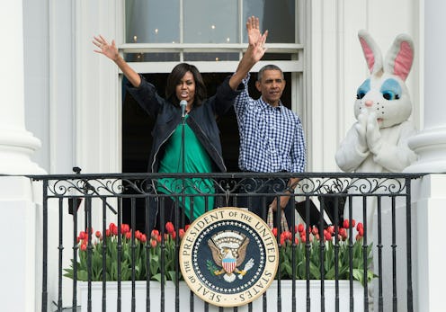 The Obamas waving from the balcony of the White House