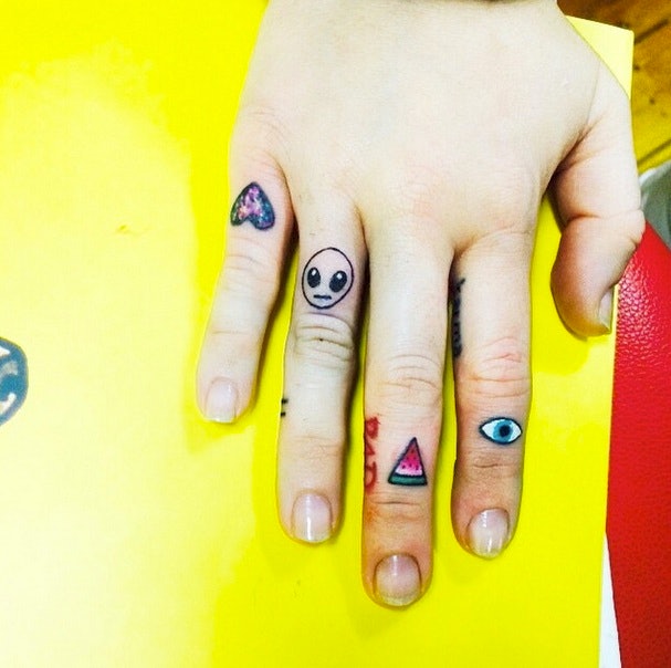 Smiley Tattoos On Fingers
