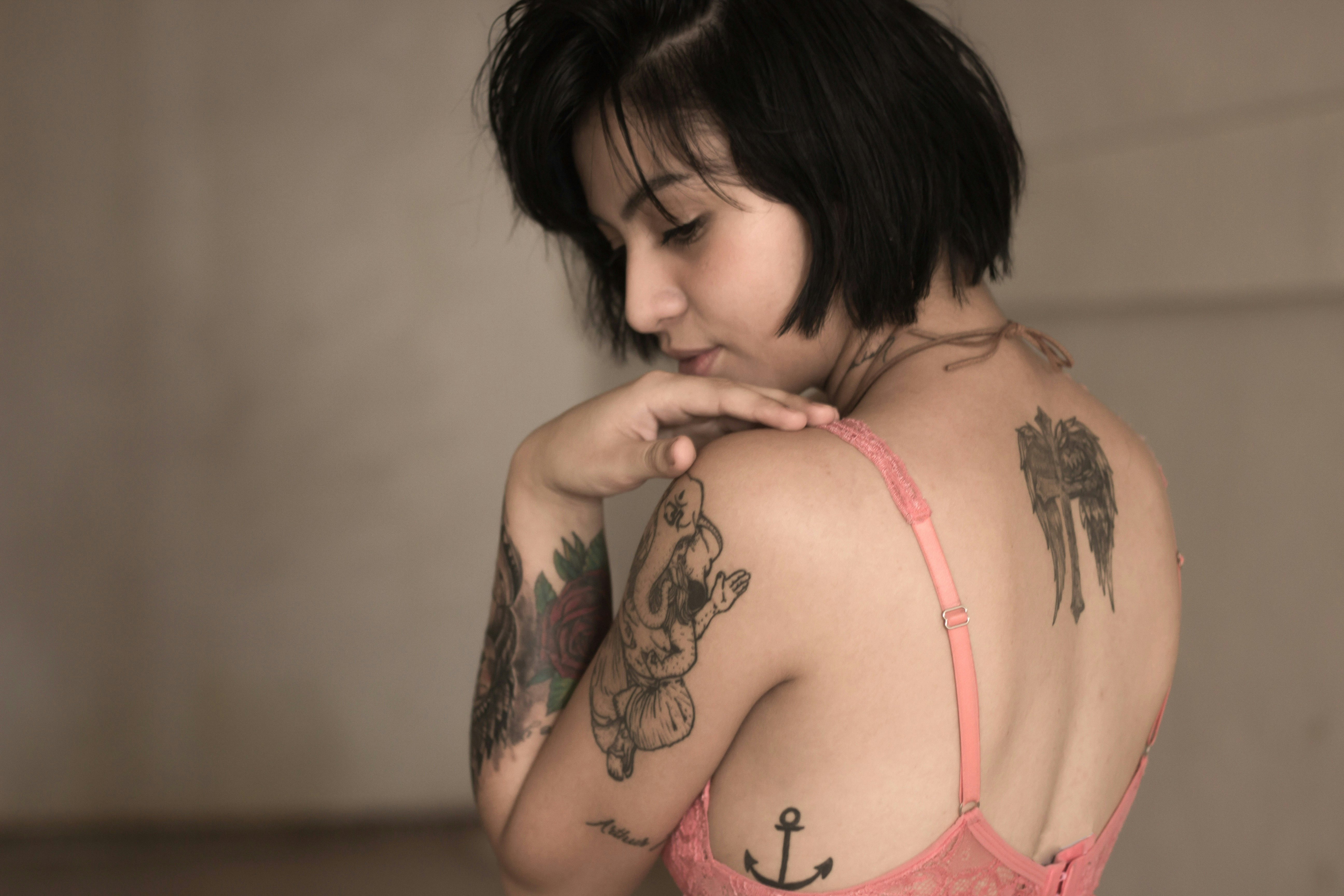Pimples on tattoos Causes treatments and prevention