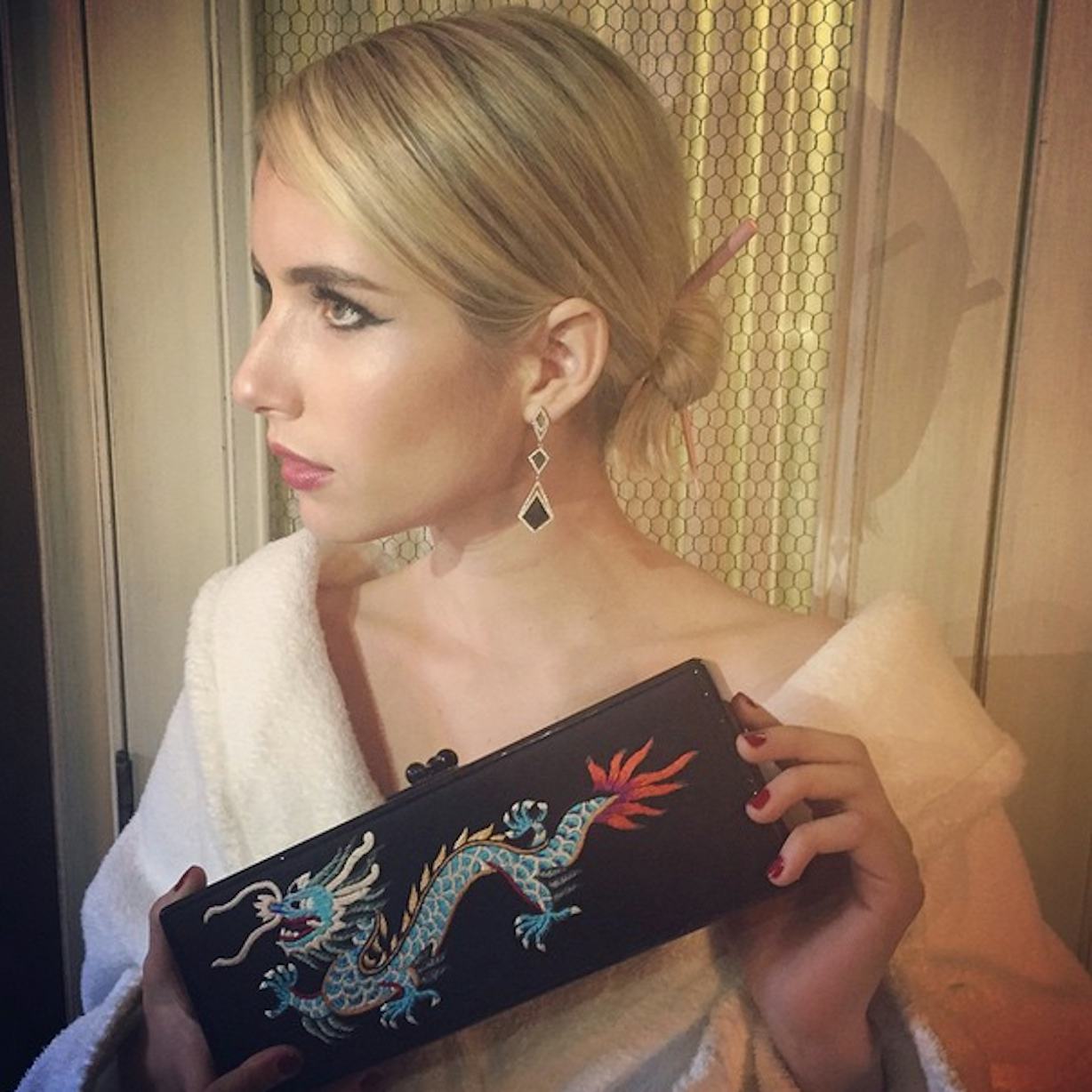 Emma Roberts' 2015 Met Gala Outfit Features CringeWorthy Hair Sticks