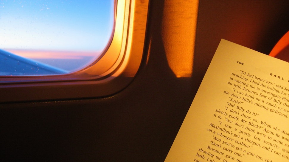 Image result for read at airplane