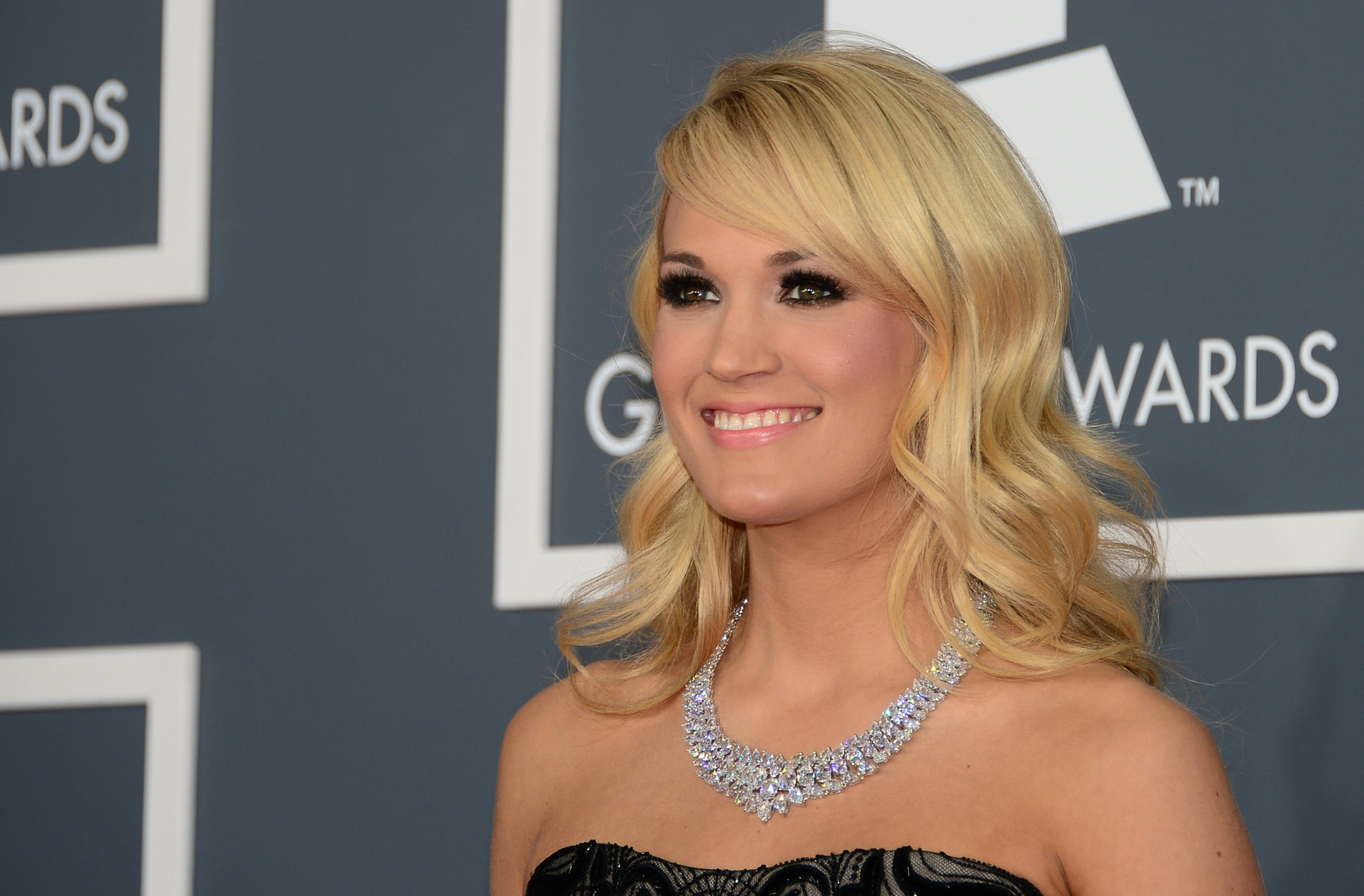 From girl-next-door to glamour! See Carrie Underwood's style