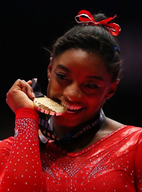 Why Do Olympians Bite Their Medals It Has More To Do With Science Than