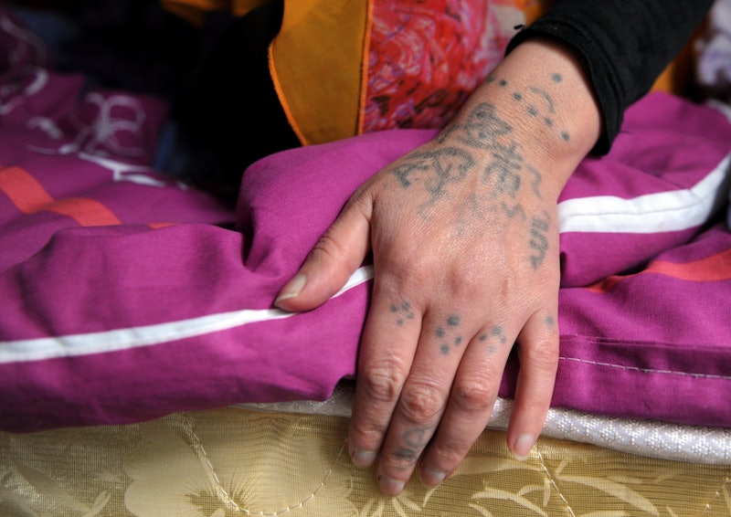 Why Do Tattoos Turn Green & Blue? Tattoo Artists Explain What Happens