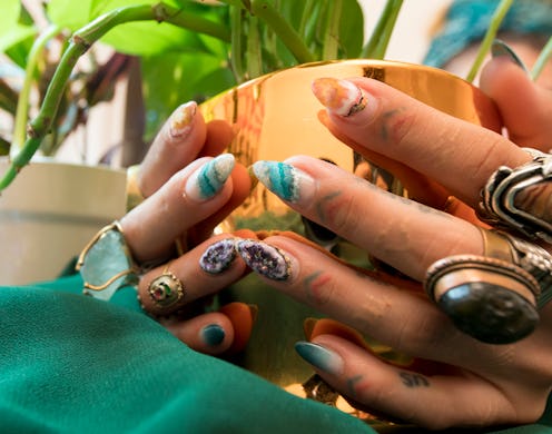 Geode nails are a top manicure trend on Pinterest.