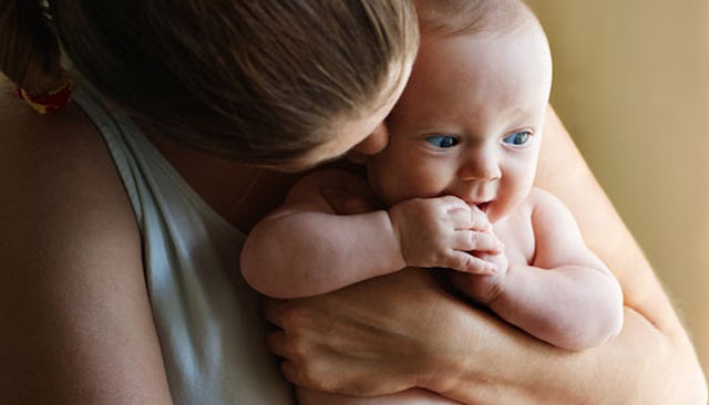 Mom holding her child