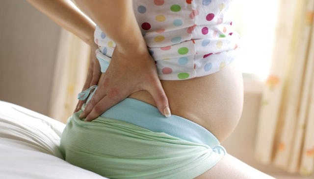 A pregnant lady feeling pain due to vulvar varicosities