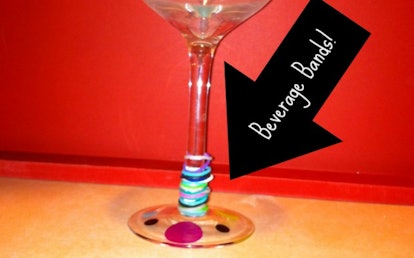 Rainbow Loom rubber bands placed on a cocktail glass, repurposed as Beverage Bands to easily disting...