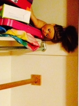 American Girl Doll in the edge of a room cluttered with things over her