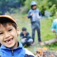 Close up of a kid smiling at overnight camp 