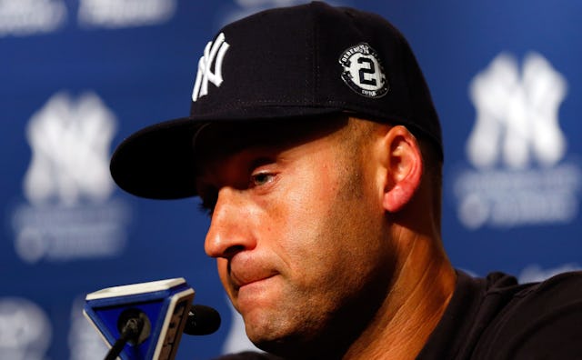 Derek Jeter during a press conference with a New York Yankees cap