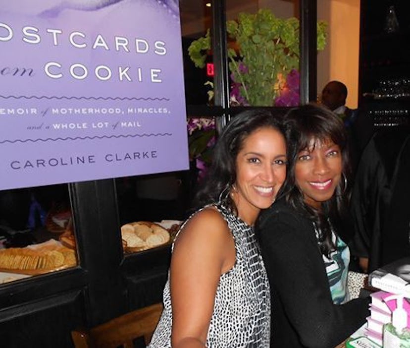 Caroline Clarke and Natalie Cole with the Postcards from Cookie banner behind them 