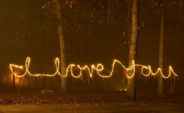 "I love you" sign made with sprinklers