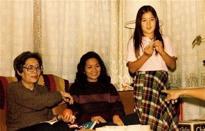 Jennifer Li Schotz in her teen years, her mom and her grandma in a living room in the Mississippi De...