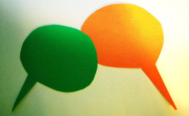 Two text message bubbles, one orange, other green representing a conversation