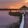 A gazebo on the lake with a beautiful sunset view in Beaufort