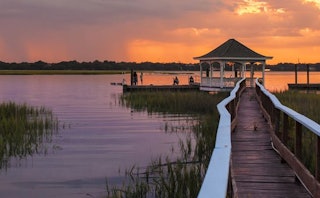 A gazebo on the lake with a beautiful sunset view in Beaufort