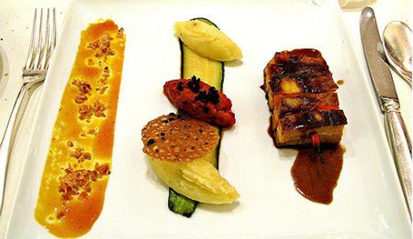 Three different parts of a meal in a Michelin three-star restaurant served on a white plate