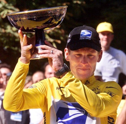 Lance Armstrong Holding The Trophy After Winning The Tour de France